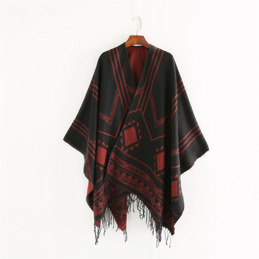 Unisex Ethno-Poncho made of soft knit with fringes and geometric pattern