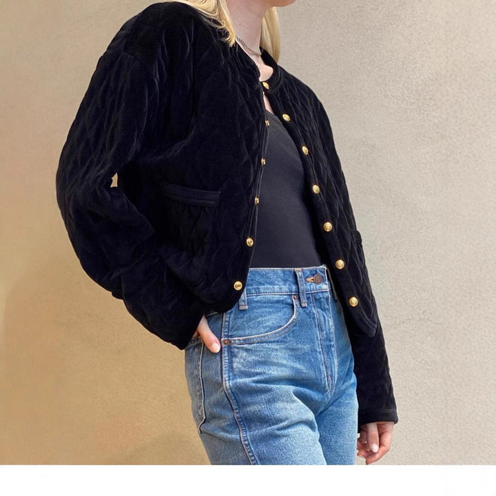 Ladies short cut quilted velvet cardigan with golden medallion buttons