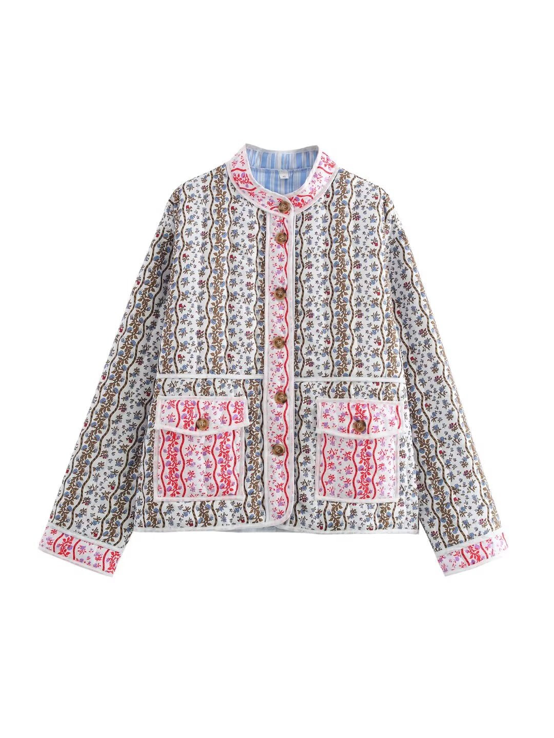 Ladies quilted short jacket with stand-up collar, patch pockets and fine ethnic print