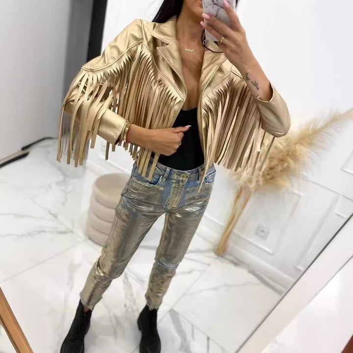 Women’s short jacket in biker style with metallic look and long leather fringes