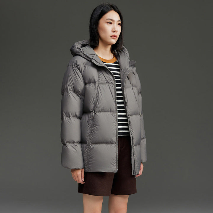 Women short cut boxy quilted jacket with detachable hood and thermo insulation