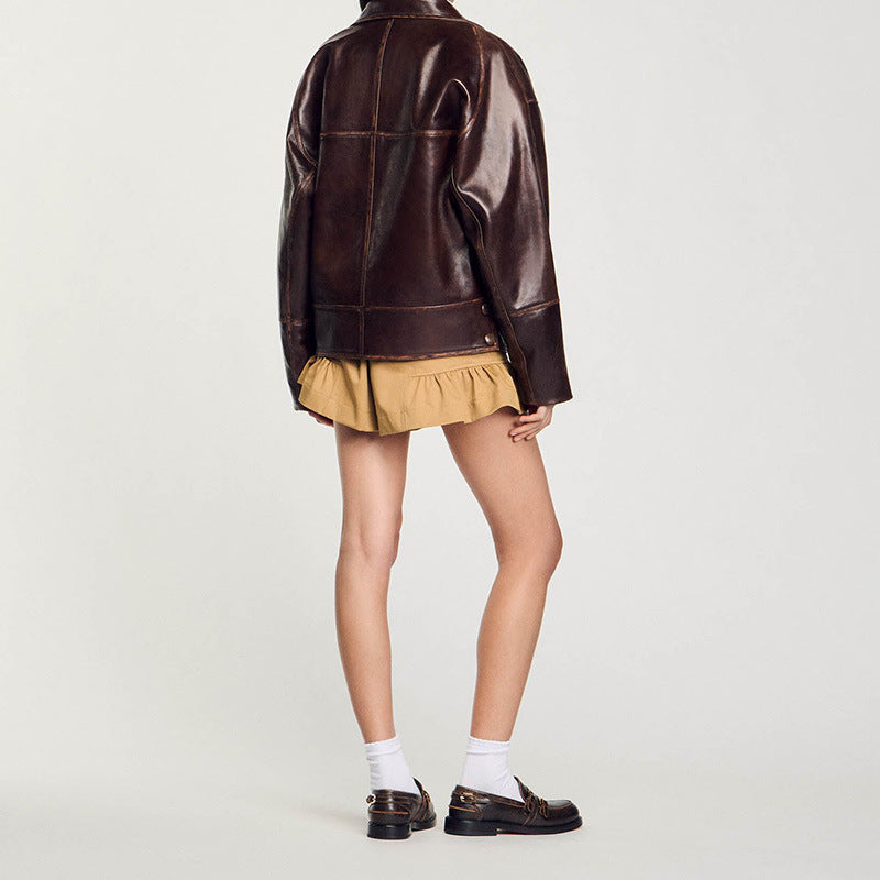 Women Short Cut Oversized Leather Jacket with Round Collar and Flap Pockets