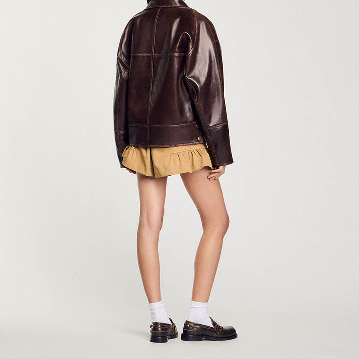 Women Short Cut Oversized Leather Jacket with Round Collar and Flap Pockets