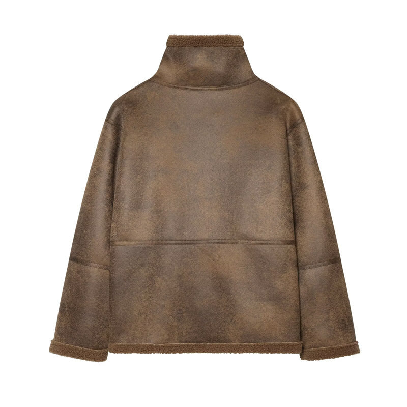 Ladies short jacket in lambskin look with stand-up collar, button and buckle closure