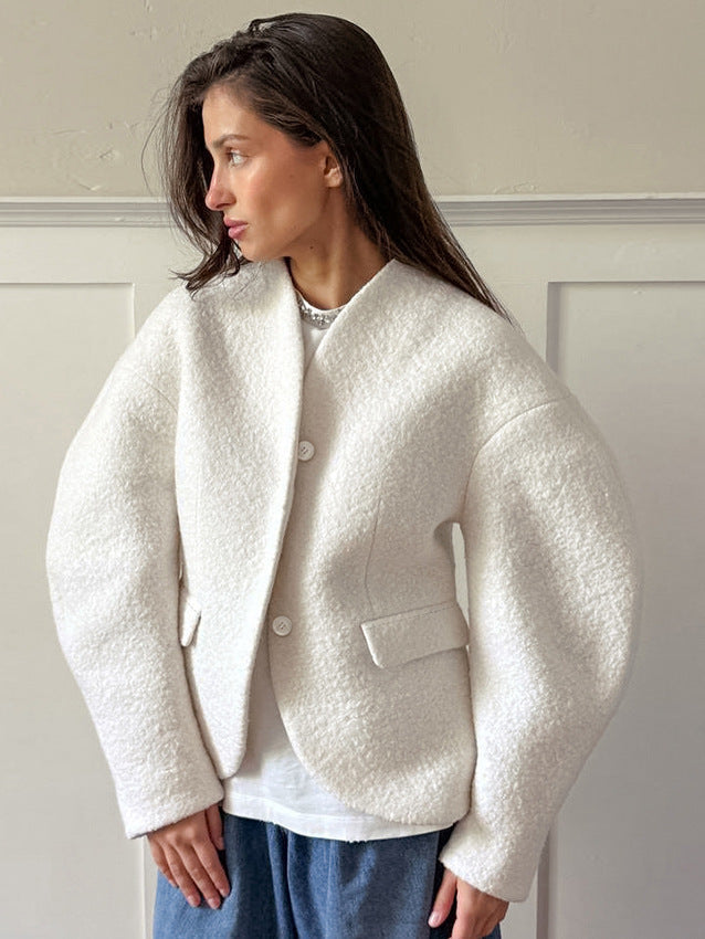 Ladies short jacket in boucle style with oversized sleeves and flap pockets
