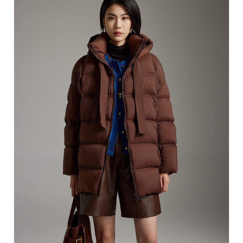 Ladies quilted warming down jacket with hood and loose silhouette