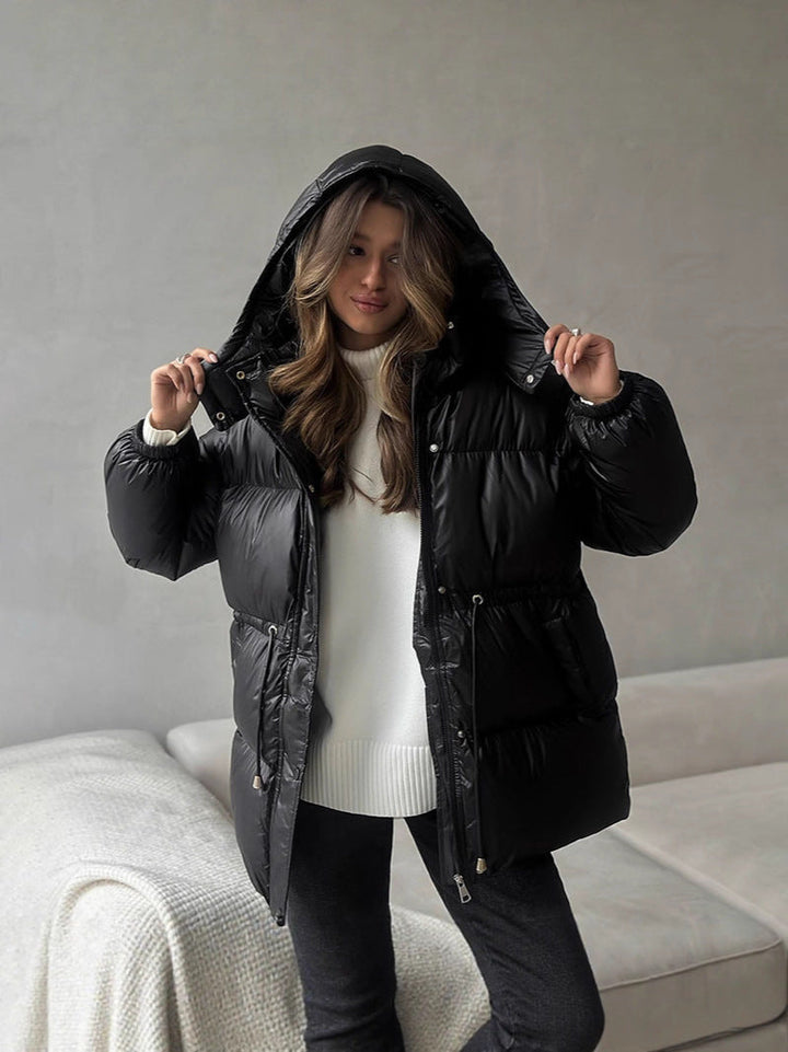 Women’s quilted down jacket with fitted drawstring and hood