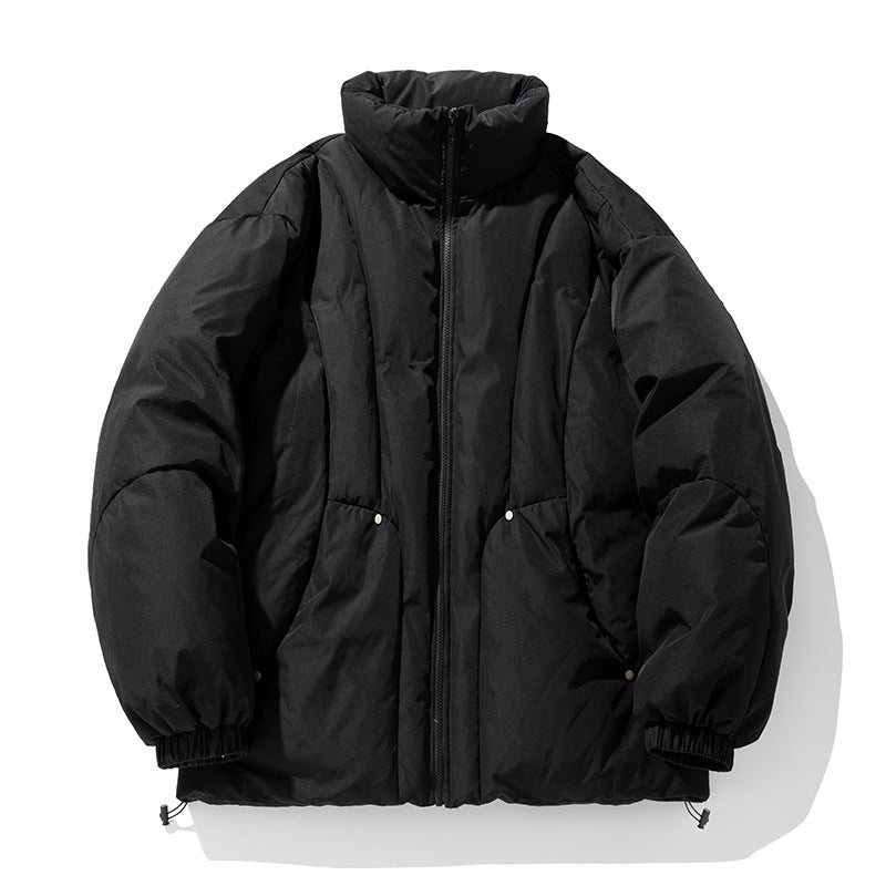Unisex Boxy Puffer Jacket with vertical quilted design, high stand-up collar, and drawstring hem