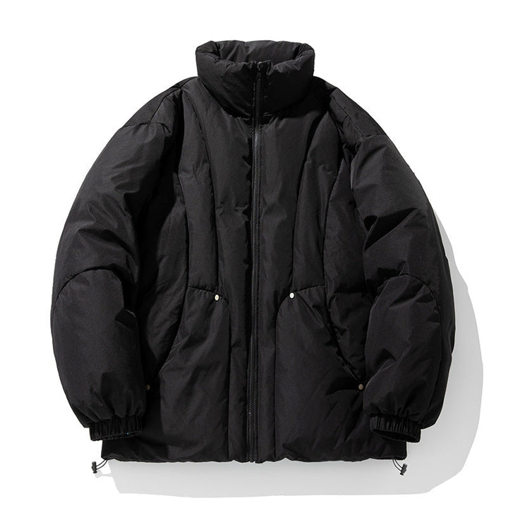 Unisex Boxy Puffer Jacket with vertical quilted design, high stand-up collar, and drawstring hem