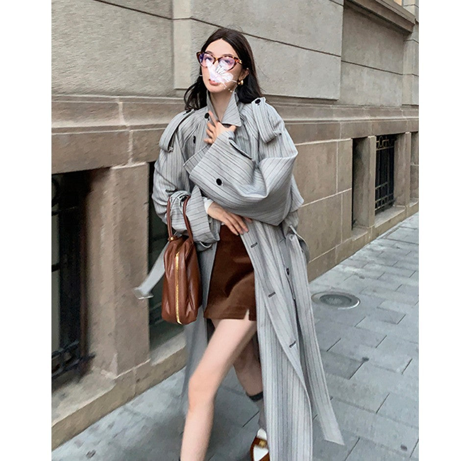 Women’s Long Pinstripe Trench Coat with Tie Belt Shoulder Straps and Flared Hem