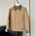 Women's quilted jacket with contrast faux leather collar and snap button closure