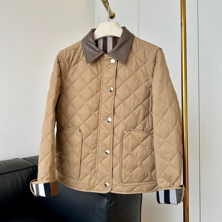 Ladies fashionable quilted jacket with elegant leather collar