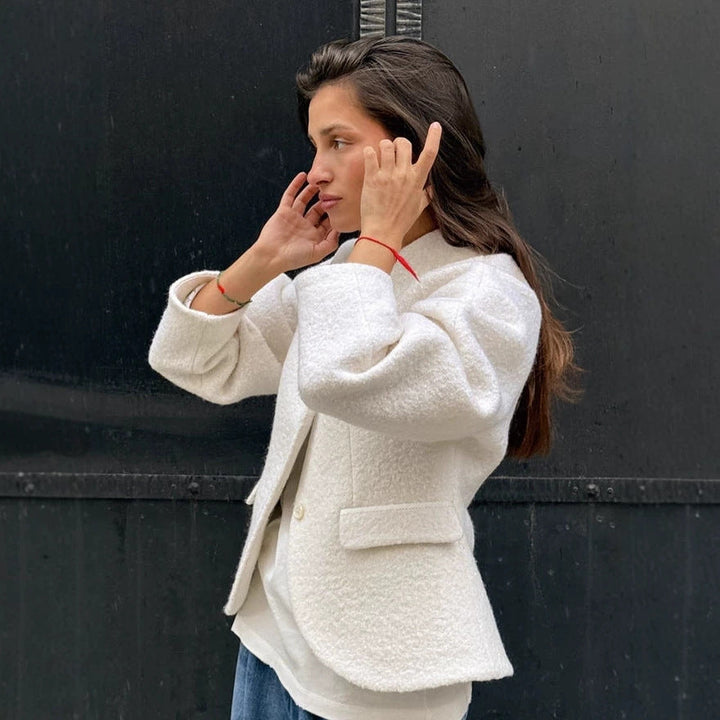 Ladies short jacket in boucle style with oversized sleeves and flap pockets