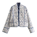Ladies quilted kimono jacket with floral all-over pattern and contrasting piping