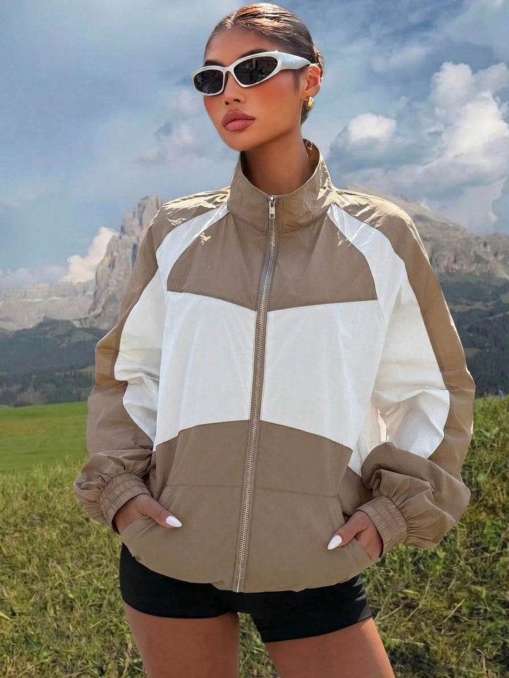 Women Lightweight color Block Windbreaker with Stand-Up Collar and Zip Closure