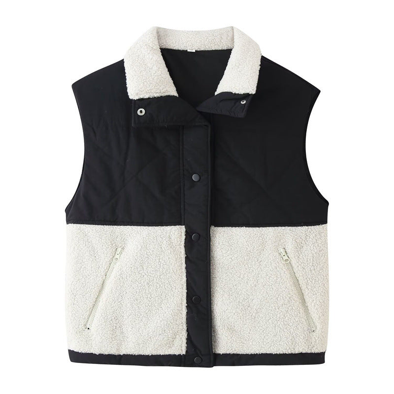 Ladies quilted vest with teddy fleece insert, stand-up collar and zip pockets