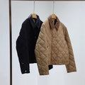 Women's quilted jacket with contrasting faux leather collar and boxy cut