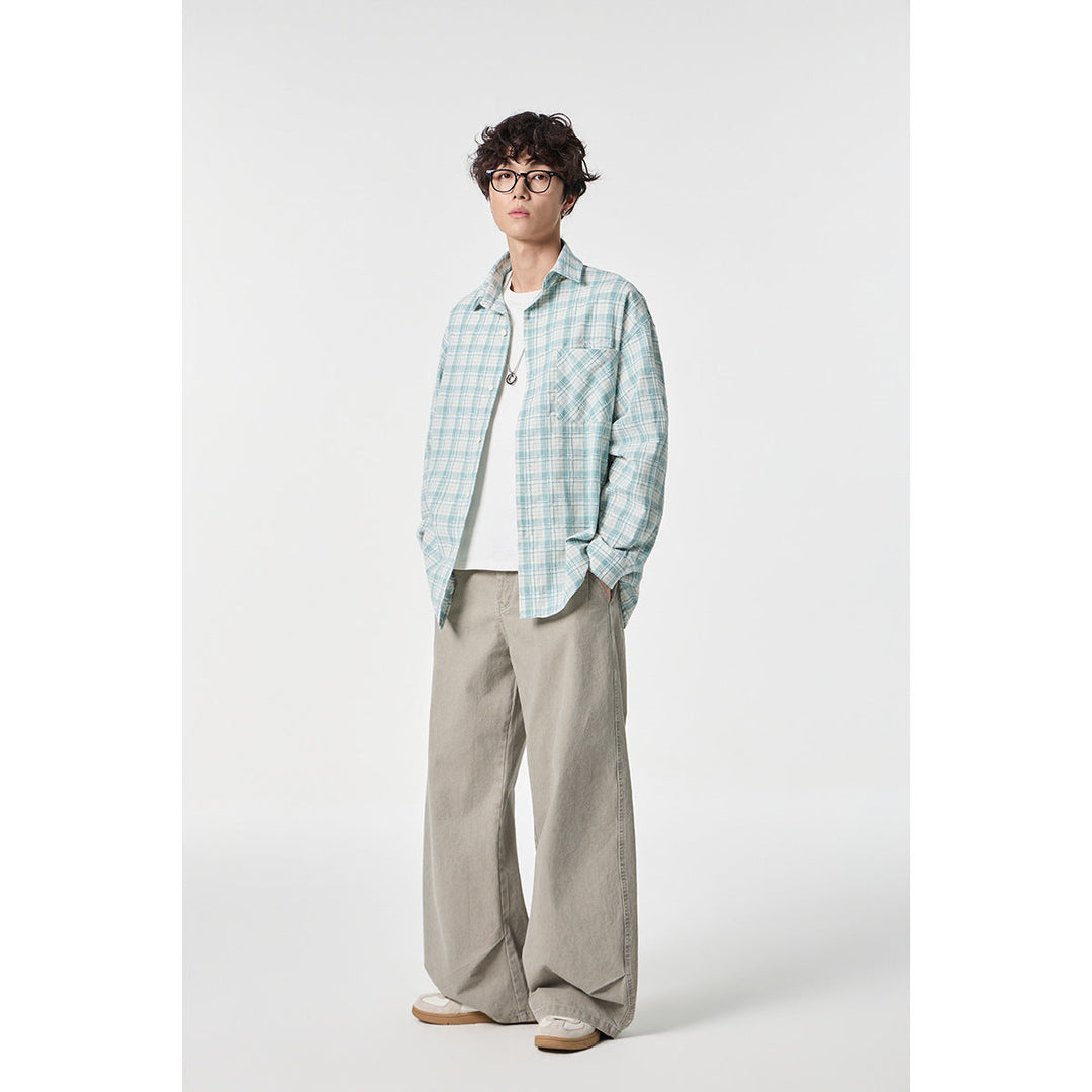Unisex Oversize Check Shirt Jacket made of lightweight cotton blend with a patch chest pocket