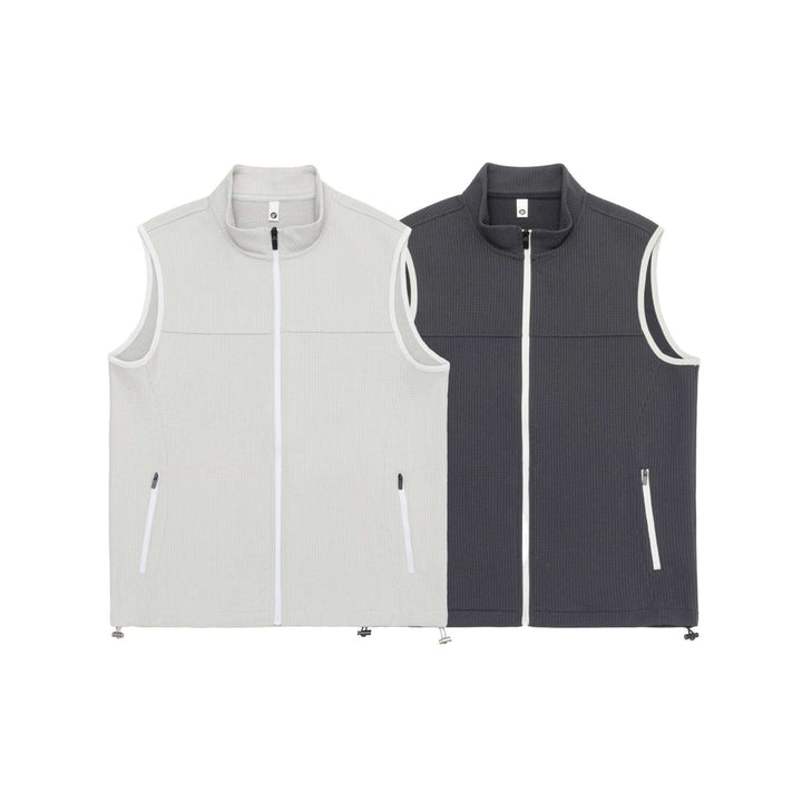 Unisex waffle-structured outdoor vest with stand-up collar, full-length zip, and drawstring hem