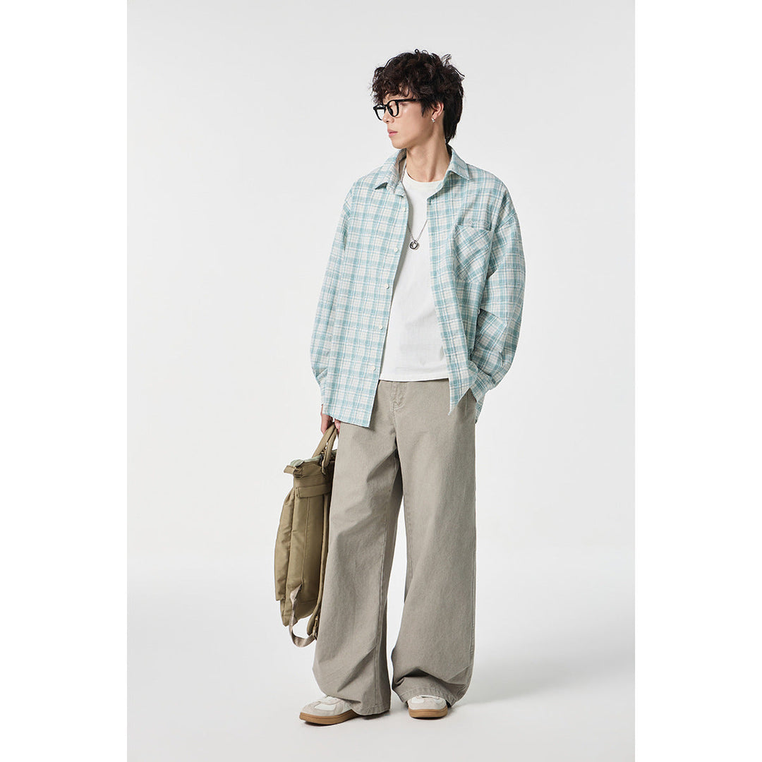Unisex Oversize Check Shirt Jacket made of lightweight cotton blend with a patch chest pocket