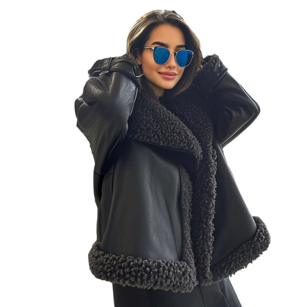 Women’s short-cut aviator leather jacket with teddy lining, large collar, and oversized silhouette