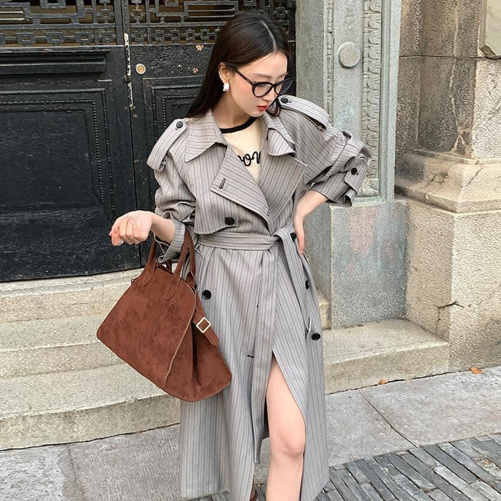 Women’s Long Pinstripe Trench Coat with Tie Belt Shoulder Straps and Flared Hem