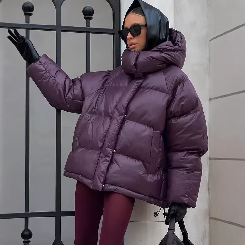 Ladies short padded oversized quilted jacket with high standing collar and hood