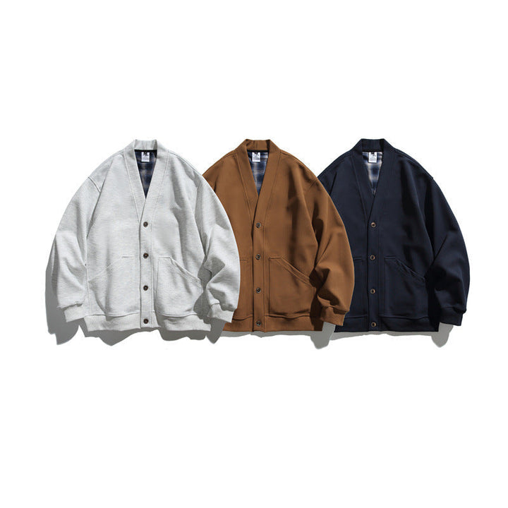 Unisex Oversized cardigan jacket made of heavyweight French terry with V-neck and patch pockets