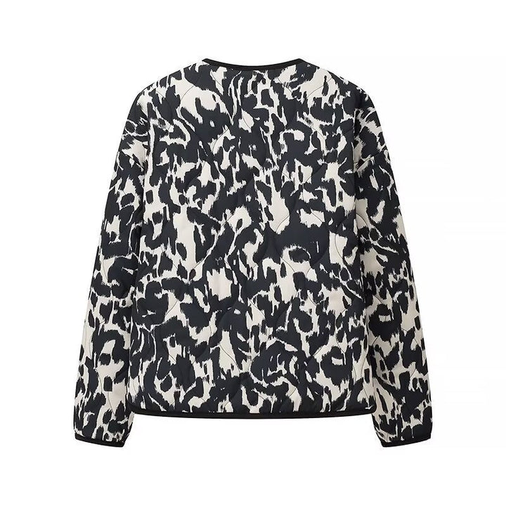 Women’s quilted jacket in oversized boxy cut with round neckline and abstract animal print
