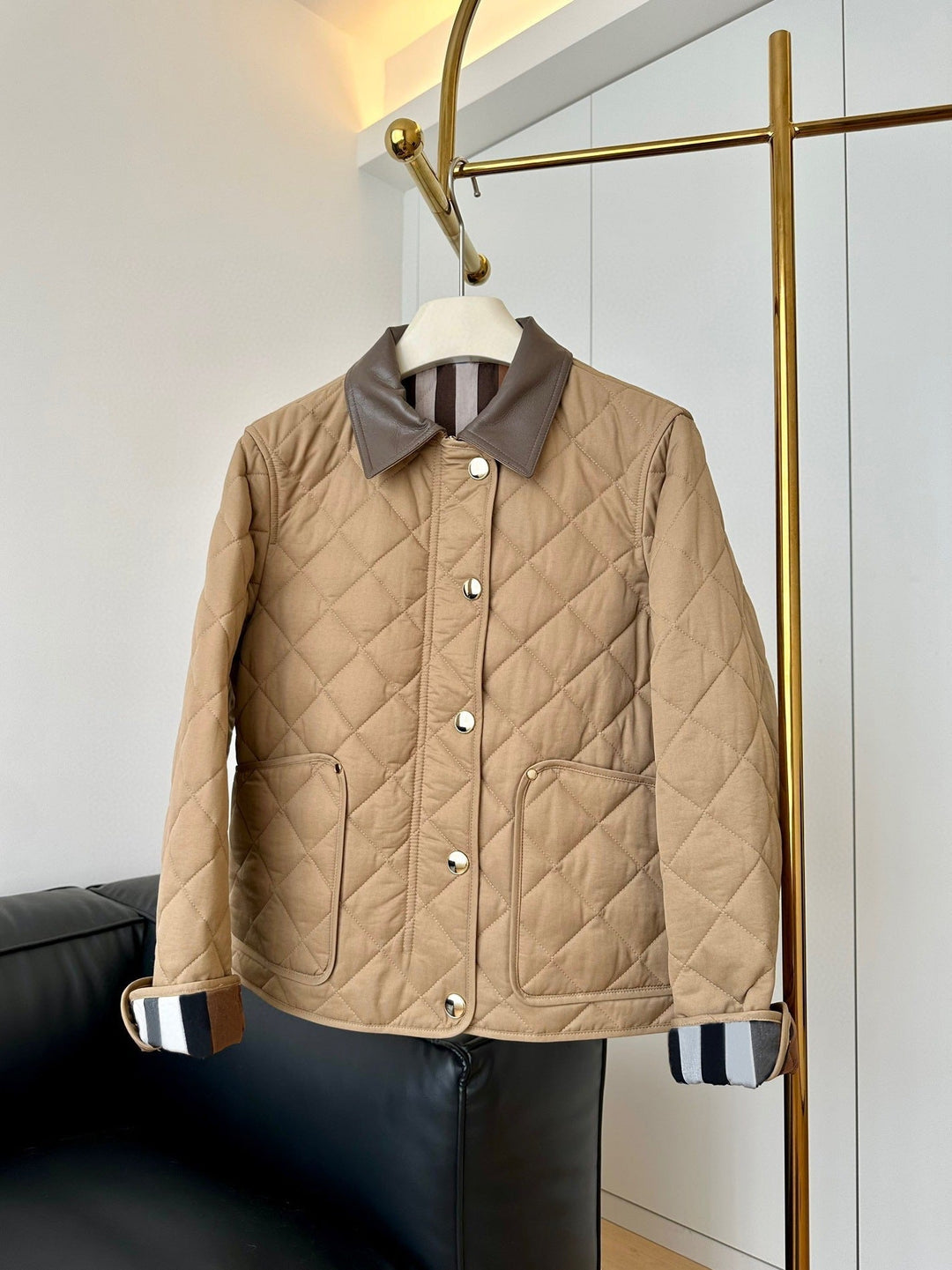 Ladies fashionable quilted jacket with elegant leather collar