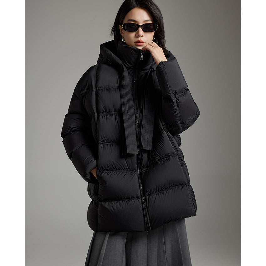 Ladies quilted warming down jacket with hood and loose silhouette