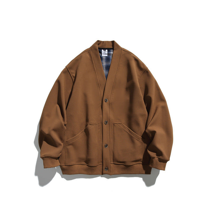 Unisex Oversized cardigan jacket made of heavyweight French terry with V-neck and patch pockets