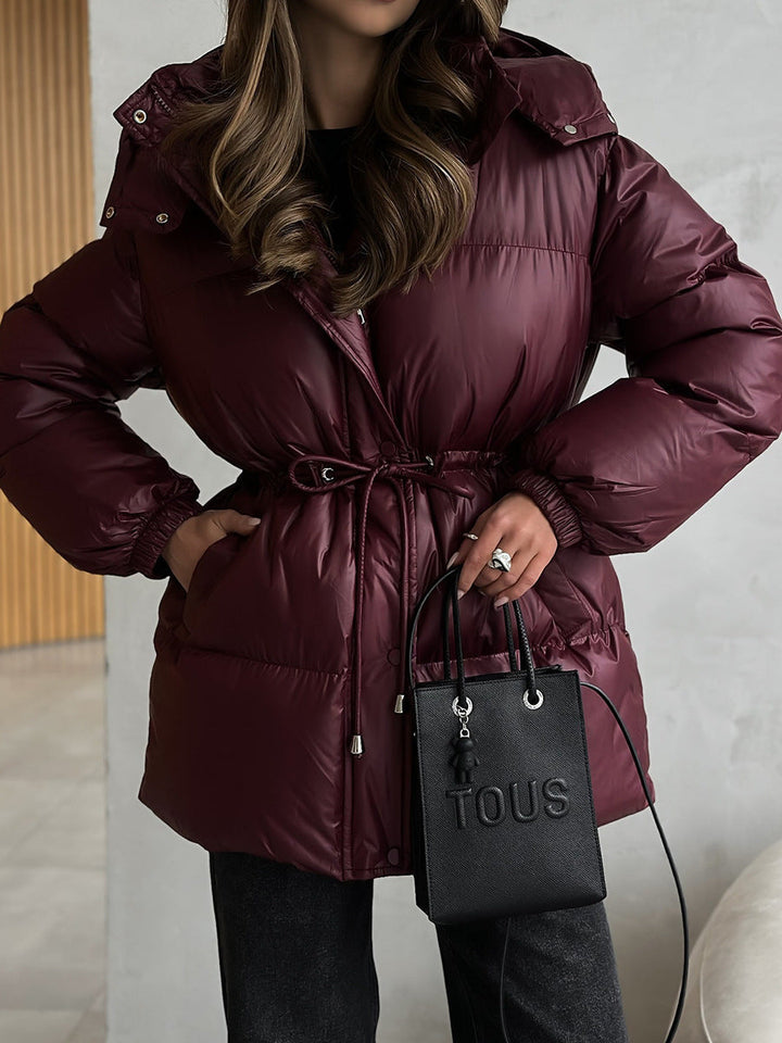 Women’s quilted down jacket with fitted drawstring and hood
