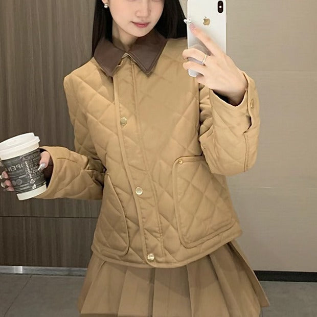 Ladies fashionable quilted jacket with elegant leather collar