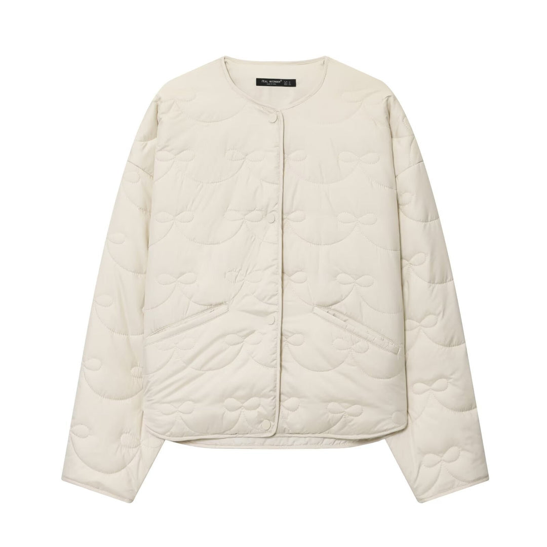 Women’s quilted jacket without collar with decorative bow quilting and snap button closure
