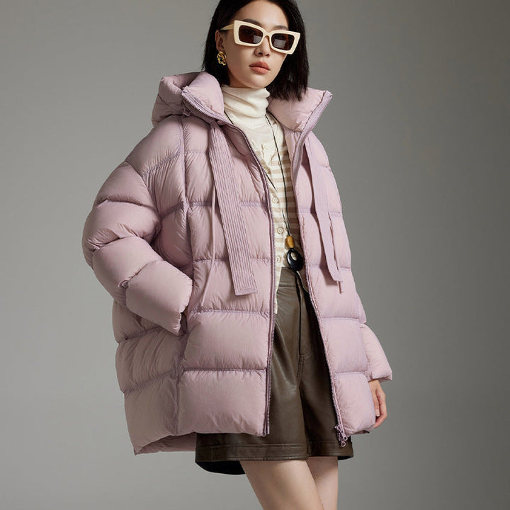 Ladies quilted warming down jacket with hood and loose silhouette