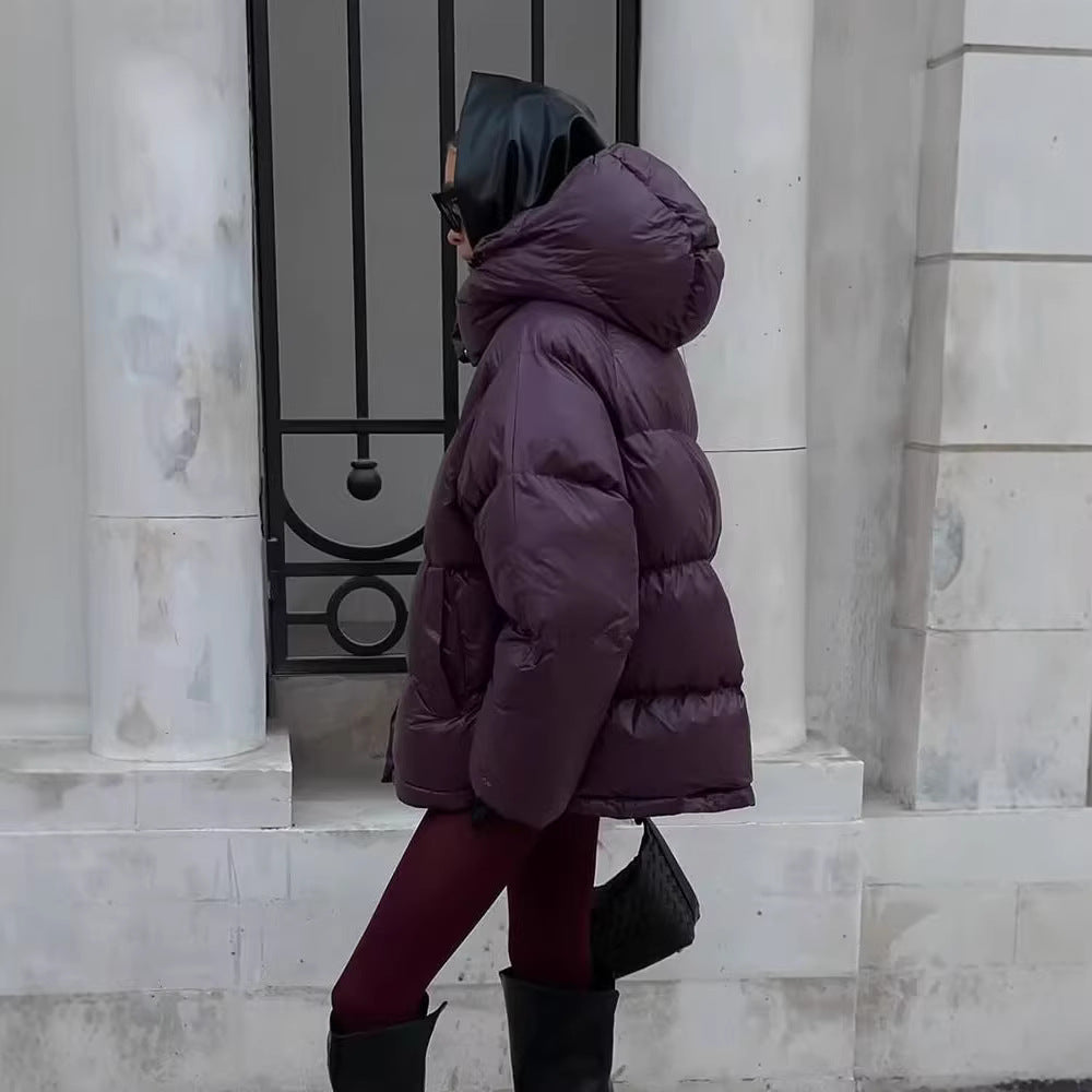 Ladies short padded oversized quilted jacket with high standing collar and hood