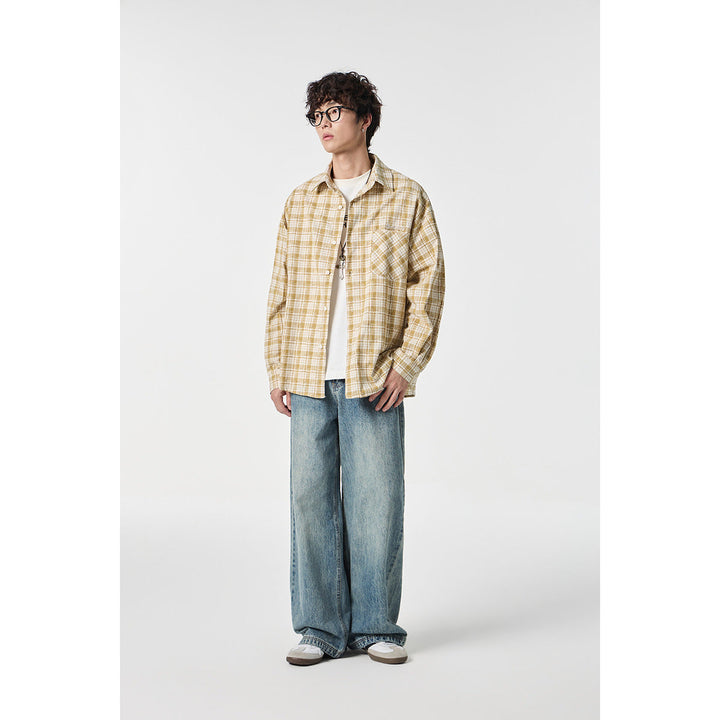 Unisex Oversize Check Shirt Jacket made of lightweight cotton blend with a patch chest pocket