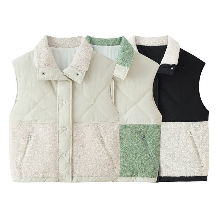 Ladies quilted vest with teddy fleece insert, stand-up collar and zip pockets