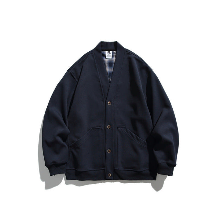 Unisex Oversized cardigan jacket made of heavyweight French terry with V-neck and patch pockets