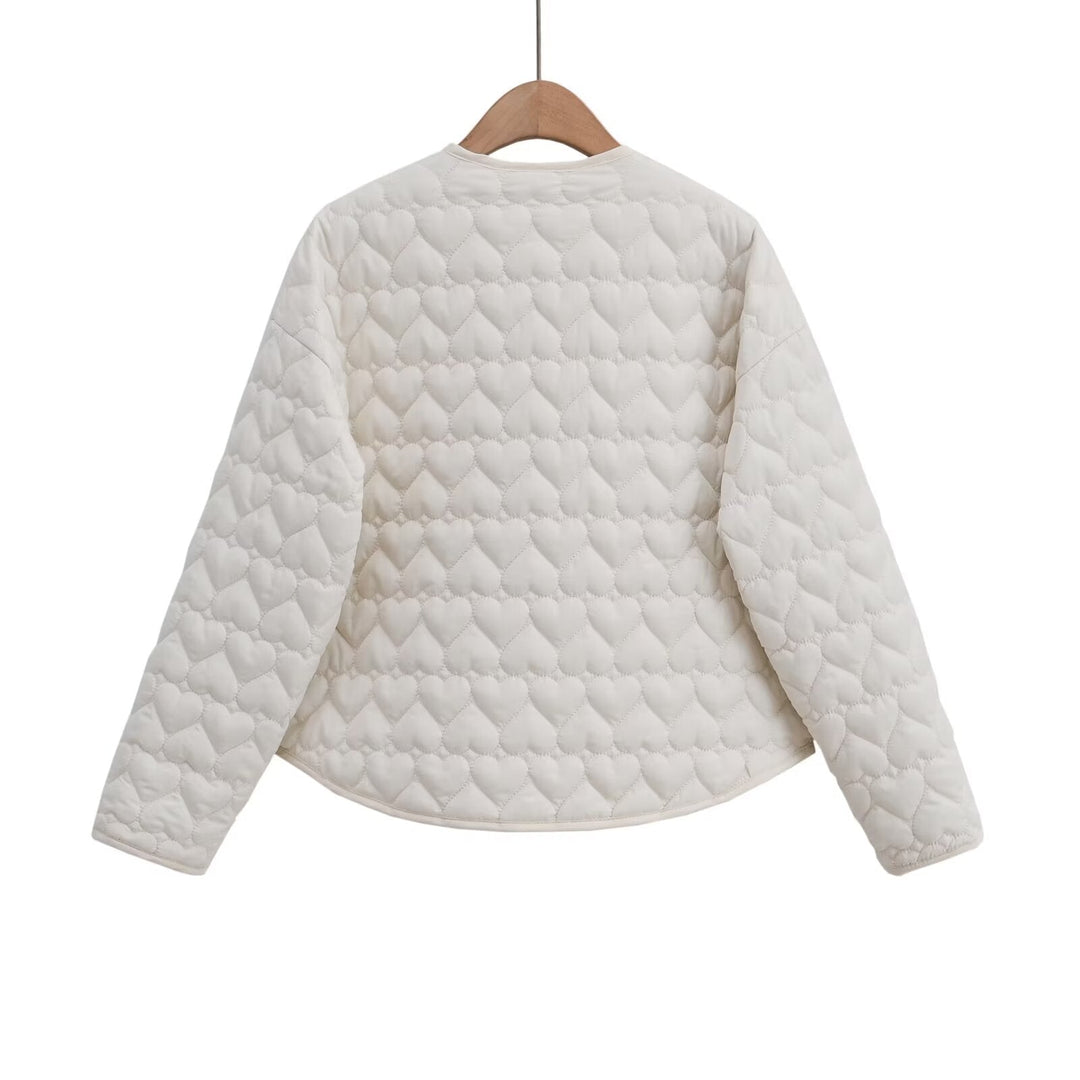 Women 100+ quilted short jacket with heart quilting, round neckline and snap buttons