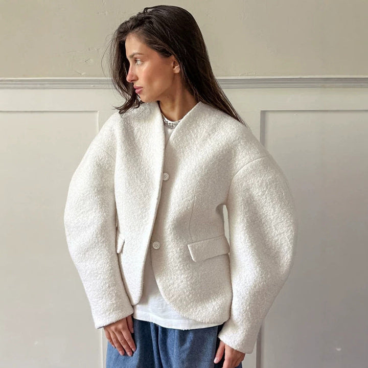 Ladies short jacket in boucle style with oversized sleeves and flap pockets