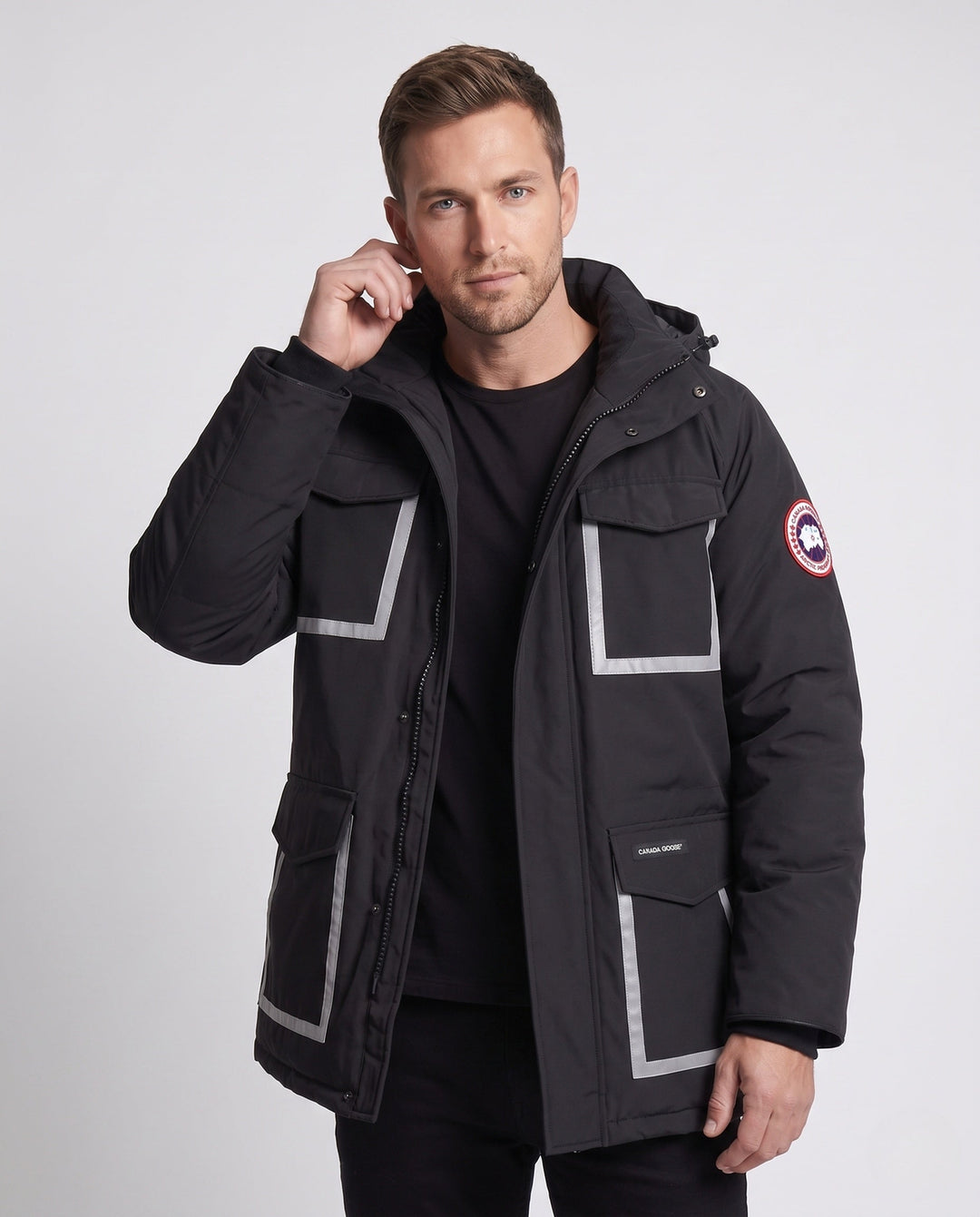 Unisex winter parka with reflective inserts and removable hood