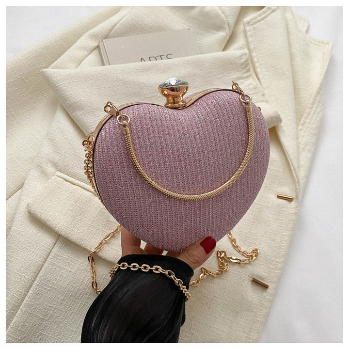 Heart-shaped metallic clutch with chain