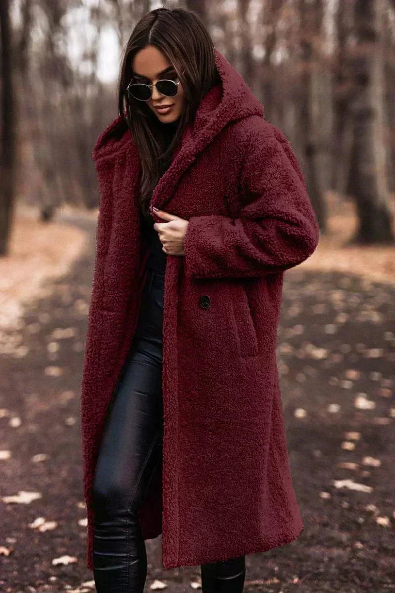 Long coat with elegant faux fur warmth and Timeless style